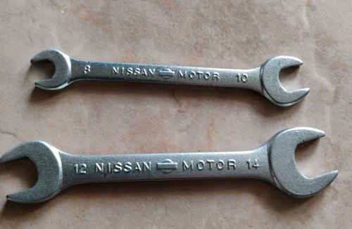 Vintage nissan motor - motor, spanners