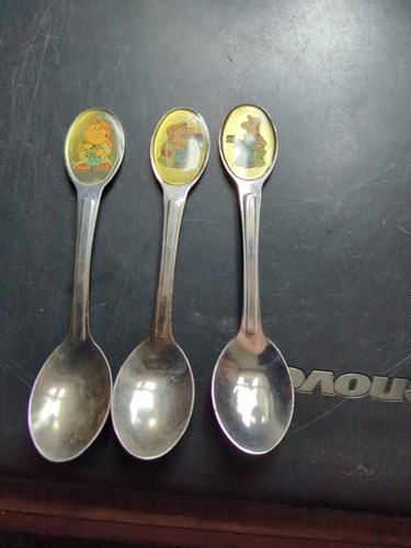Three tetley tea spoons - tetley,