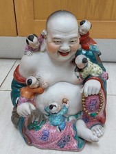 A very large Chinese porcelain figure of the "Laughing Buddha" or Budai,