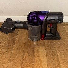 Dyson DC31 Handheld Animal Vacuum Cleaner with attachments. Needs new battery