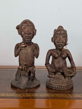Yoruba ere ibeji twin figures carved hardwood with cowries, Nigeria early 20th c