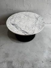 Black ribbed coffee table with White Marble top