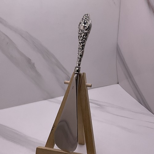 Griffin antique silver - r,