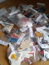 Job Lot of THIRTY PACKS OF VINTAGE BUTTONS priced at £1 per pack.
