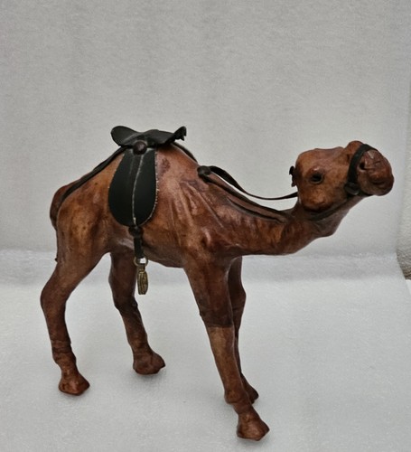 Hand carved wooden camel - hand,