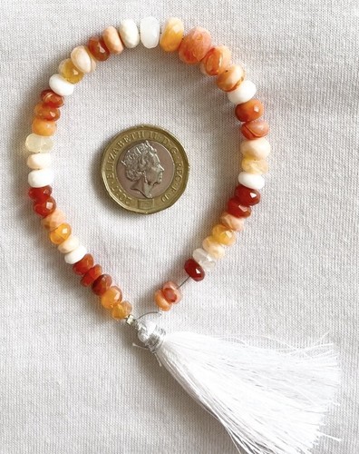 Possibly carnelian fire opal - possibly, carnelian,
