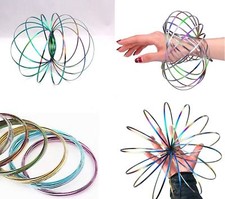 3D Magic Flow Ring Indoor Toys Kinetic Spring Arm Slinky Juggle Rainbow Dance UK