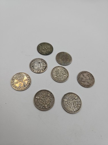 Silver three pence coins - three,