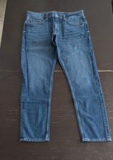 Men's stretch slim fit jeans, W 34, L31.Bright blue shade.