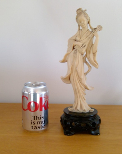 Cream oriental looking resin - looking,