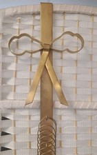 Vintage Gold Bow Hanging Over