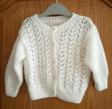 HAND KNIT WHITE SPARKLY OPEN KNIT FRONT CARDIGAN TO FIT APPROX 12 - 18 MONTHS