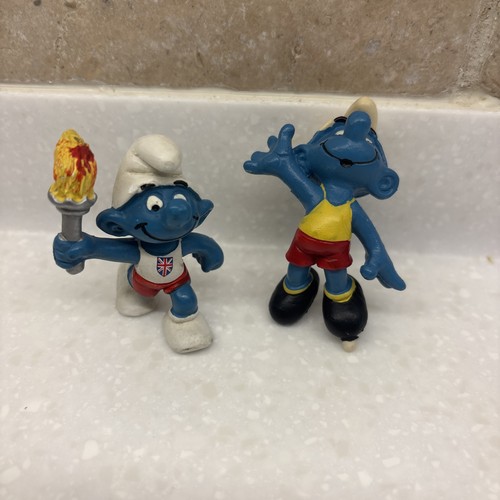 Smurf olympic torch - torch, bearer