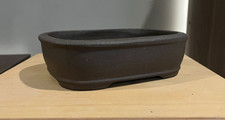 Small Unglazed Brown Ceramic
