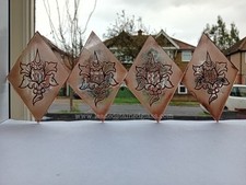 4 hand painted motifs in diamond shapes for a leaded stained glass window. RH077