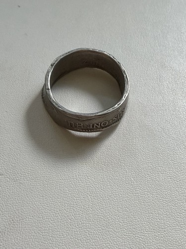 Coin ring fashioned from - coin, a