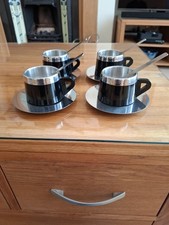 Miasino , Italy espresso  cups , saucers and spoons