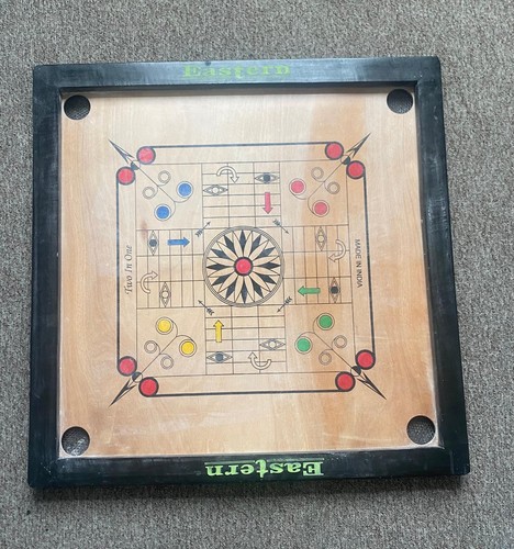 Carrom board coins striker and - carrom,