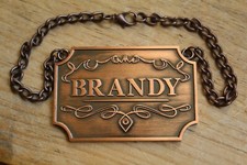 Metal brandy decanter label - metal,