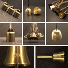 Small hand bell black - hand, bronze
