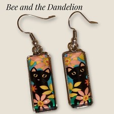 Black Cat /Kitten Surrounded