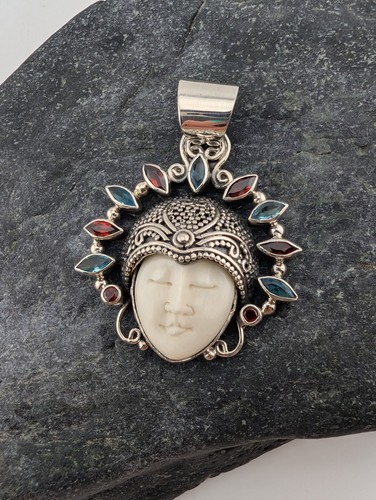 Amulet carved face - amulet,