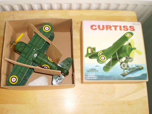 Tin plate clockwork curtiss - tin,