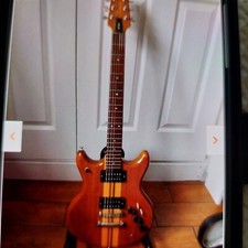 VANTAGE  VP795 ELECTRIC GUITAR IN NATURAL WOOD. 