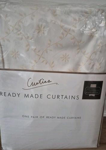 Pale cream yellow floral - &,