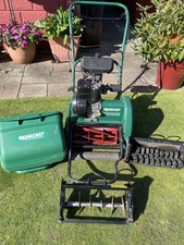 Qualcast Classic 35S Petrol  mower with scarifier and  aerator cassette.