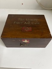 old wooden First Aid Box “Boots”