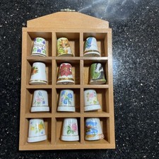 Vintage Wooden Case Containing 12 Thimbles At Least Six Are Fine Bone China.