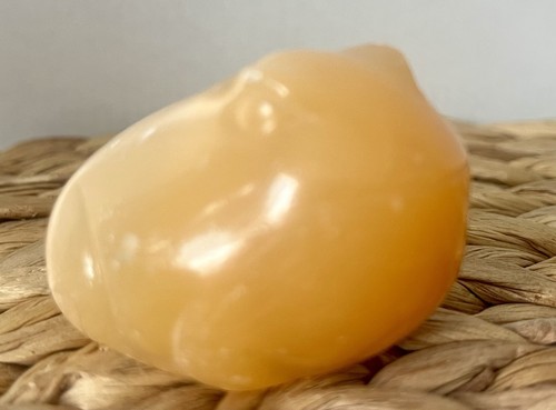 Carved orange honey calcite - orange,