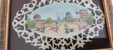 A FRAMED MINIATURE PAINTING, LIKELY PERSIAN OR MUGHAL IN STYLE