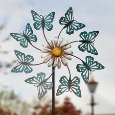 Blue butterfly and daisy - and,
