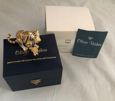 OLIVER WEBER AND SWAROVSKI