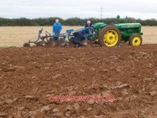 PHOTO  SPANNER TIME SOME IN FURROW ADJUSTMENT REQUIRED ON THIS RANSOME PLOUGH RO