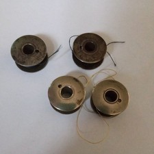  4 Vintage Singer sewing machines bobbins 
