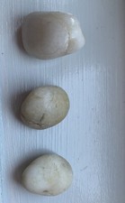 WHITE CRYSTAL/STONE,SNOW QUARTZ AND AN EGG STONE