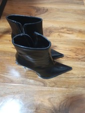 Brand new, never worn Zara black leather boots in size 37 (EU).