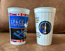 2 Vintage 1999 NASA Kennedy Space Center Plastics Drinking Cups ISS Saturn V