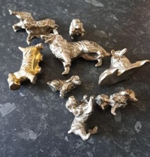 Solid silver coloured metal ornaments x8 dogs 