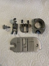 Singer presser foot, plate, feed dog, bobbin holder set