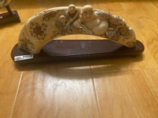 Decorative tusk-syle sculpture