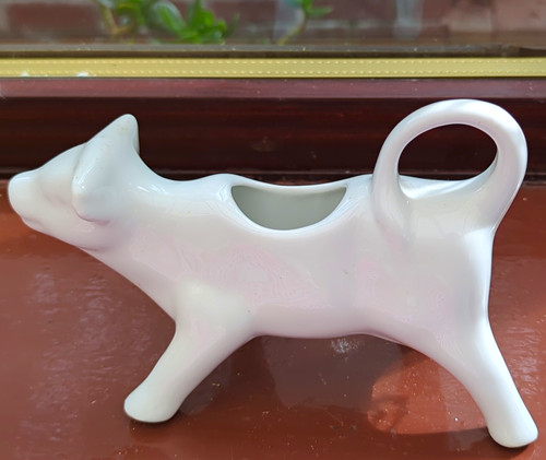 White ceramic cow - white,