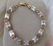 9 Carat Gold bracelet - hallmarked - set with Clear Princess cut stones
