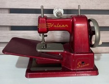 Red Vintage Vulcan Sawing