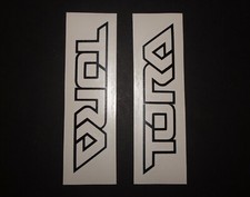 2 TORA BLACK OUTLINE ONLY LOGO