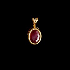 9ct Yellow Gold Oval Treated Ruby Pendant (8x6mm) - Optional Chain