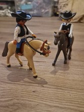 Vintage Playmobil Sheriff Figures On Horses One Male. One Female